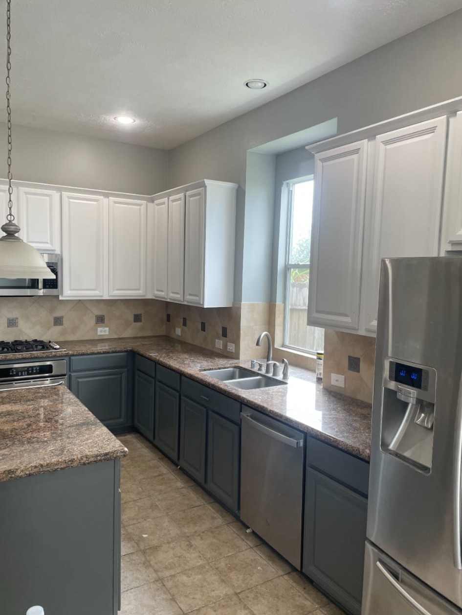 Kitchen with painted cabinets by AR Pro Painting